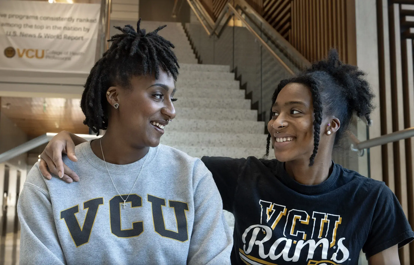 Maikalah (left) and Maikah Flores will graduate this month with degrees in health services from VCU’s College of Health Professions. (Kevin Morley, Enterprise Marketing and Communications)